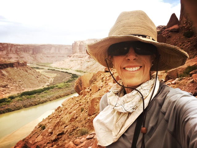 Nature Fix author Florence Williams smiles for the camera in a desert canyon 