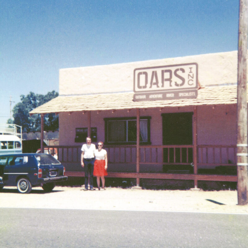 Pam and George Wendt stand in front of the OARS office in Angels Camp in the early days of the company