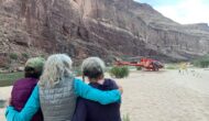 A helicopter lands at Nevills Beach in Grand Canyon to evacuate the author