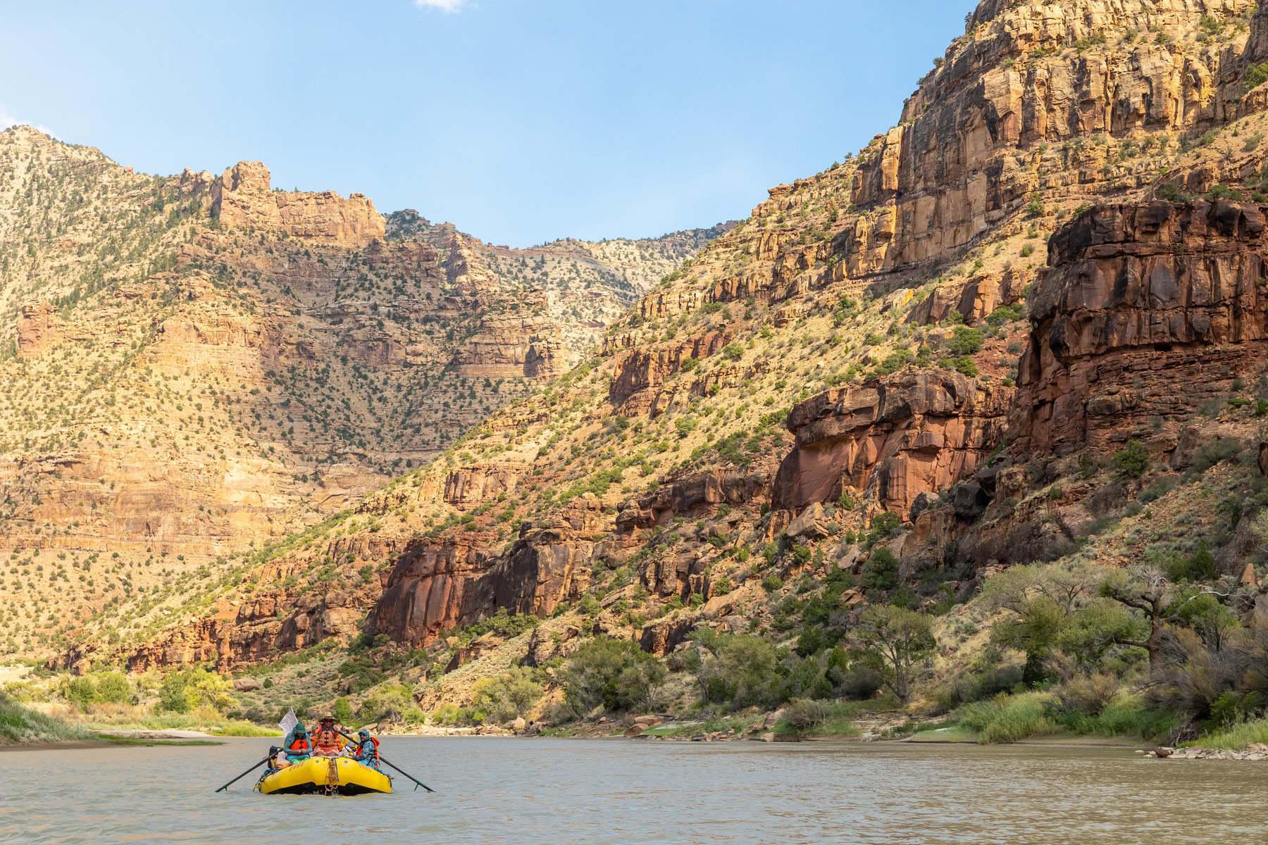A raft floats down the Green River in Desolation Canyon.