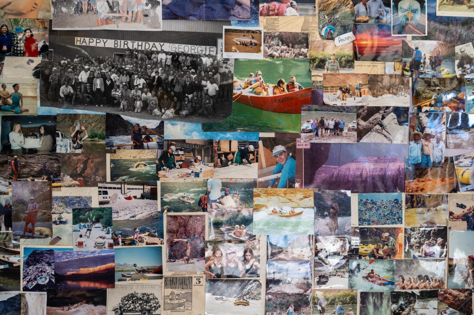 Photos on the wall at the OARS Grand Canyon Dories headquarters.
