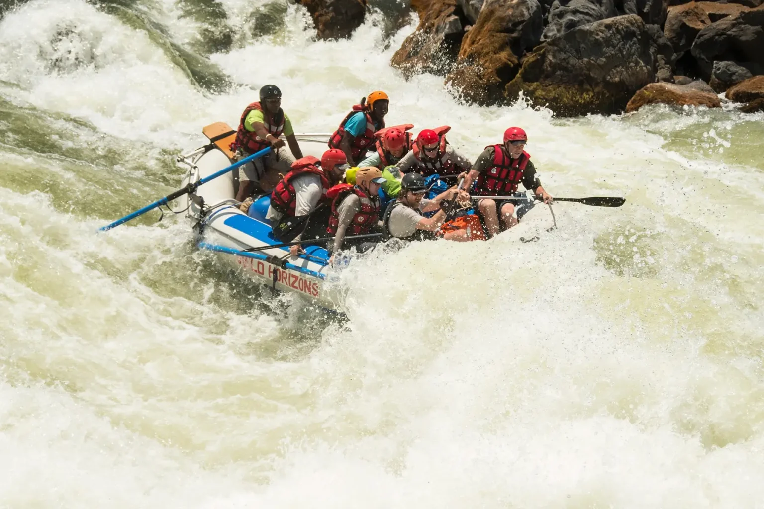 Ghostrider Rapid on the Zambezi River engulfs rafters