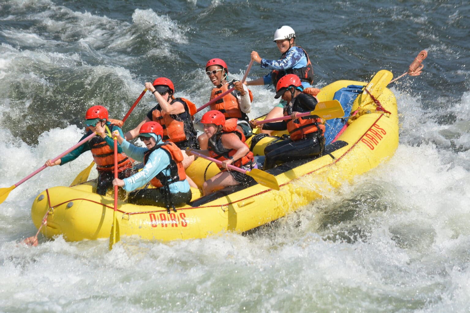 A group of rafters splashes through Hospital Bar Rapid on the South Fork of the American River. 