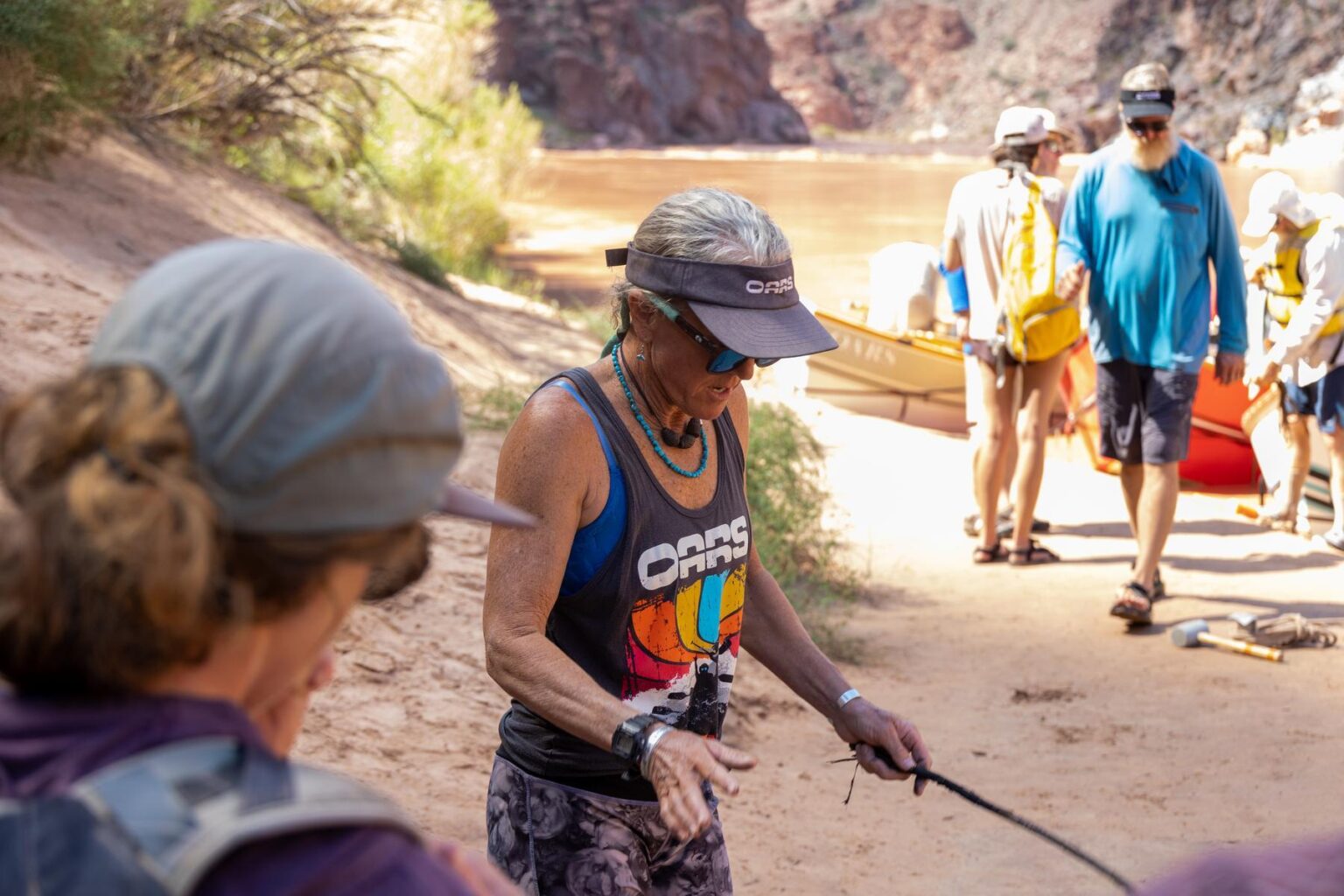 Dory guide Cindell Dale discusses the logistics of running an upcoming rapid on the Colorado River
