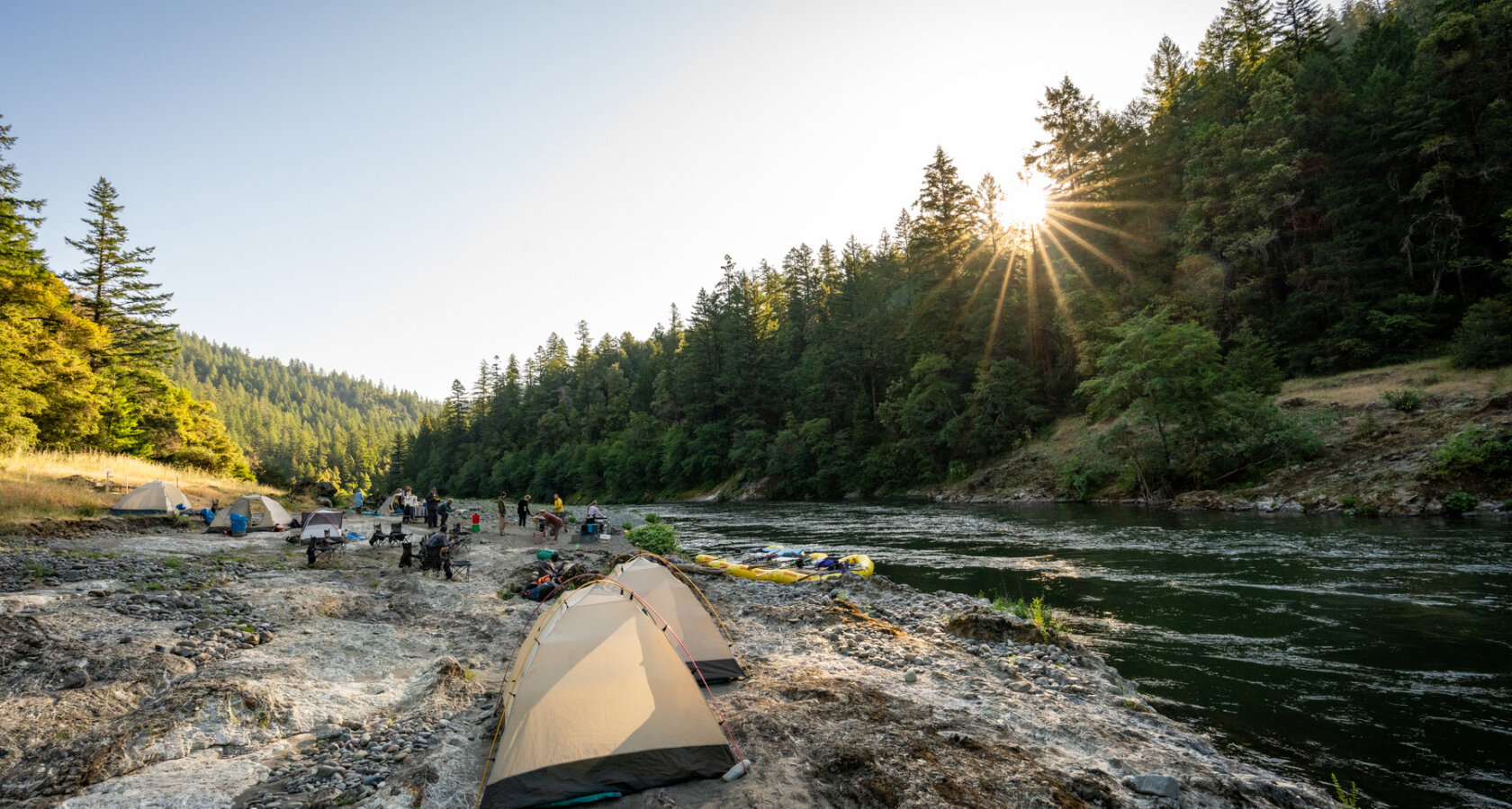 A camp on the Rogue River at sunrise