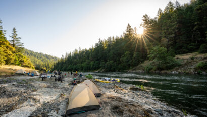 A camp on the Rogue River at sunrise