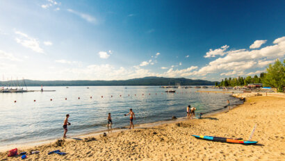 Kids playing on the beach at Legacy Park in McCall, Idaho