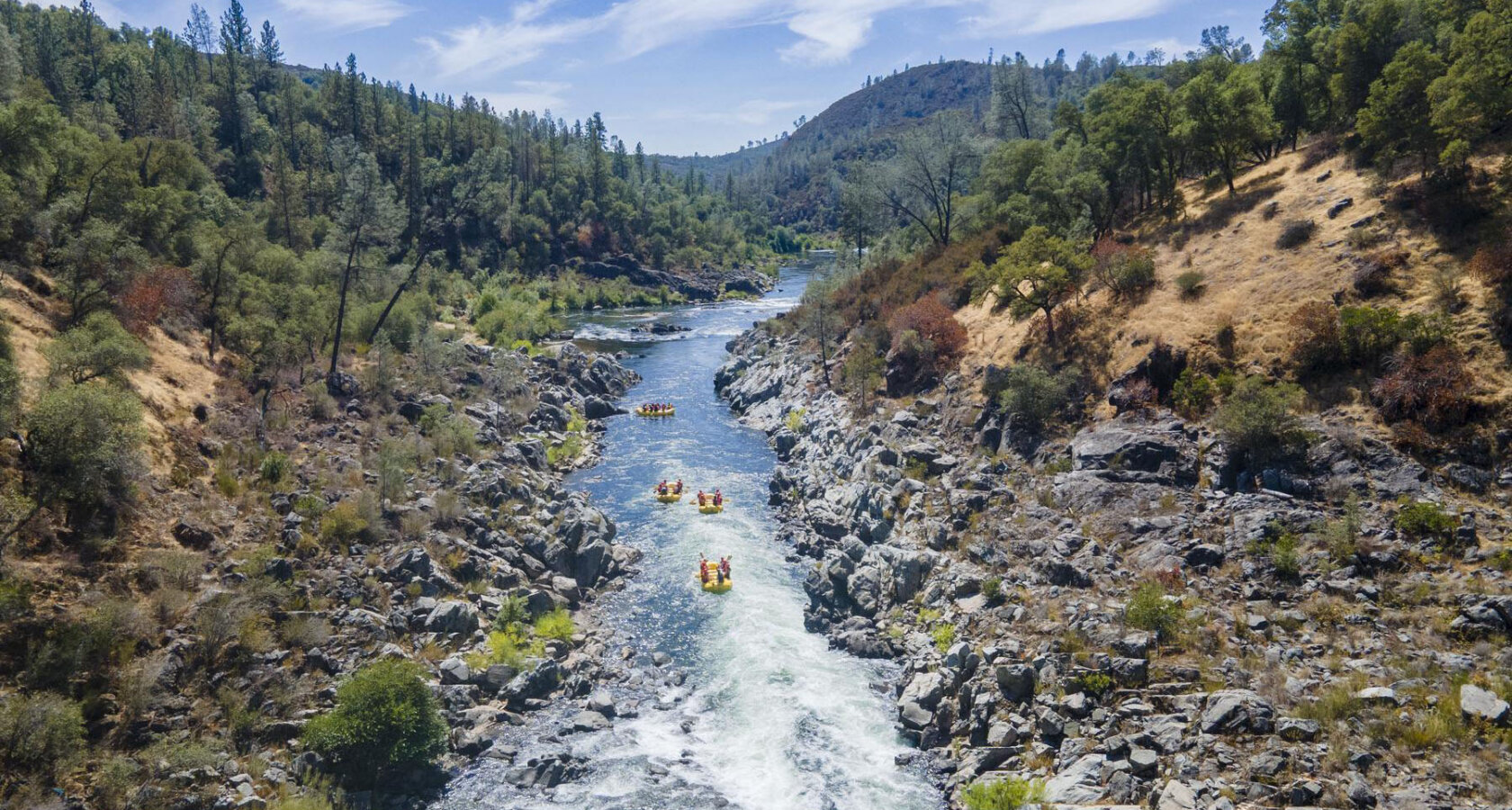 OARS rafts floating down the South Fork American River